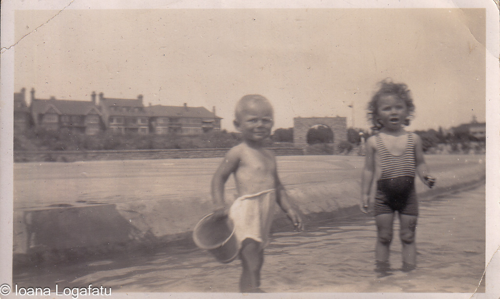Children enjoying a sunny day at the seaside