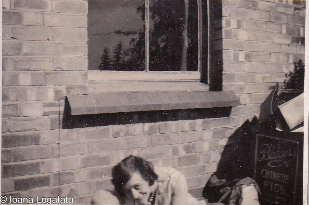 Enjoying a moment of quiet outside a brick wall