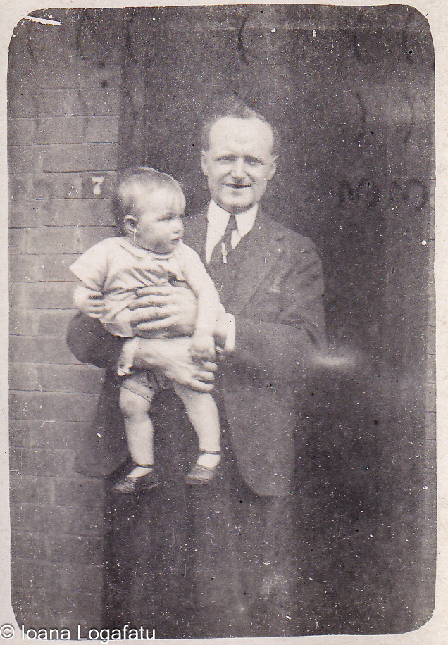 Happy moment between father and baby in the sun