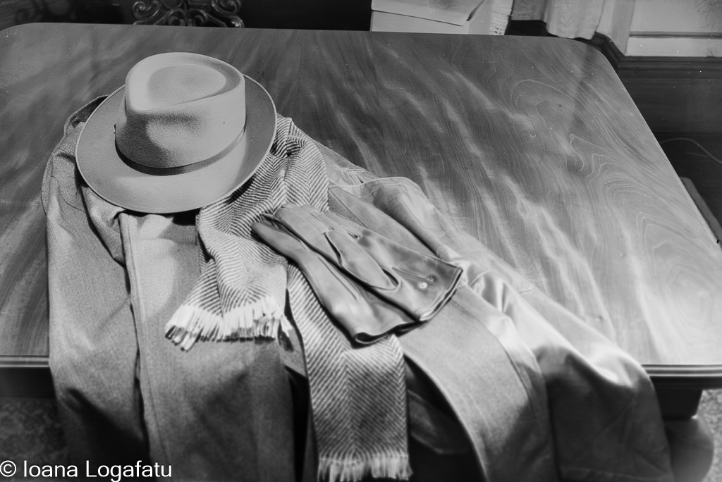 Elegant attire laid out on a polished wooden table
