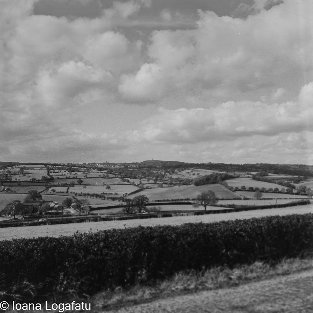 Rolling hills and vibrant skies over countryside
