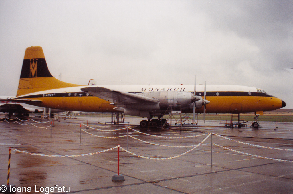 Vintage aircraft resting at the airport terminal