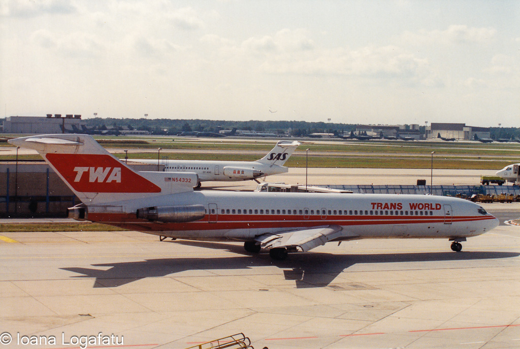 Classic airliner at busy airport