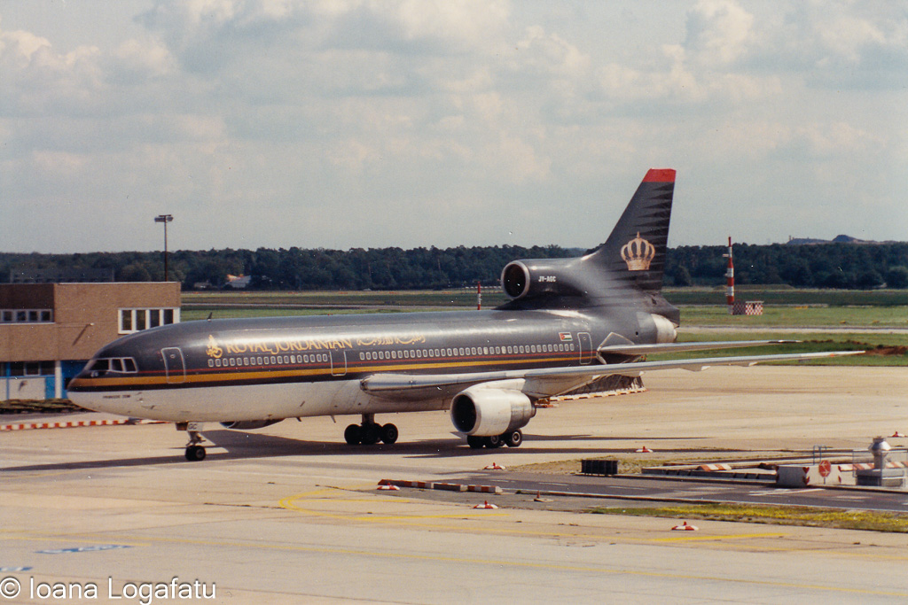 Airplane taxiing on a sunny day at the airport