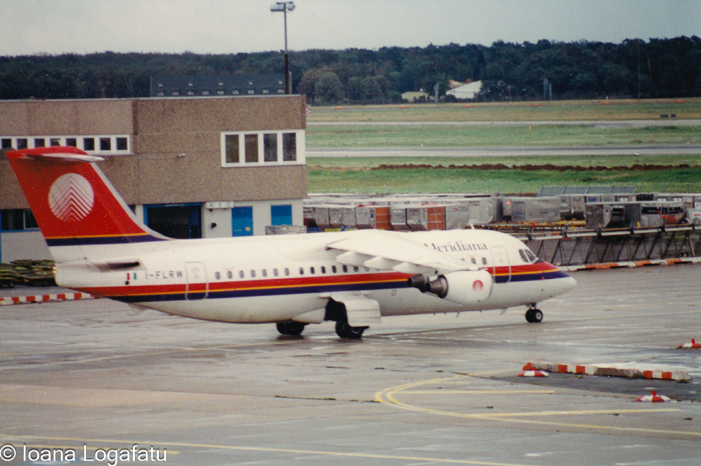 Vintage airplane at the bustling airport terminal