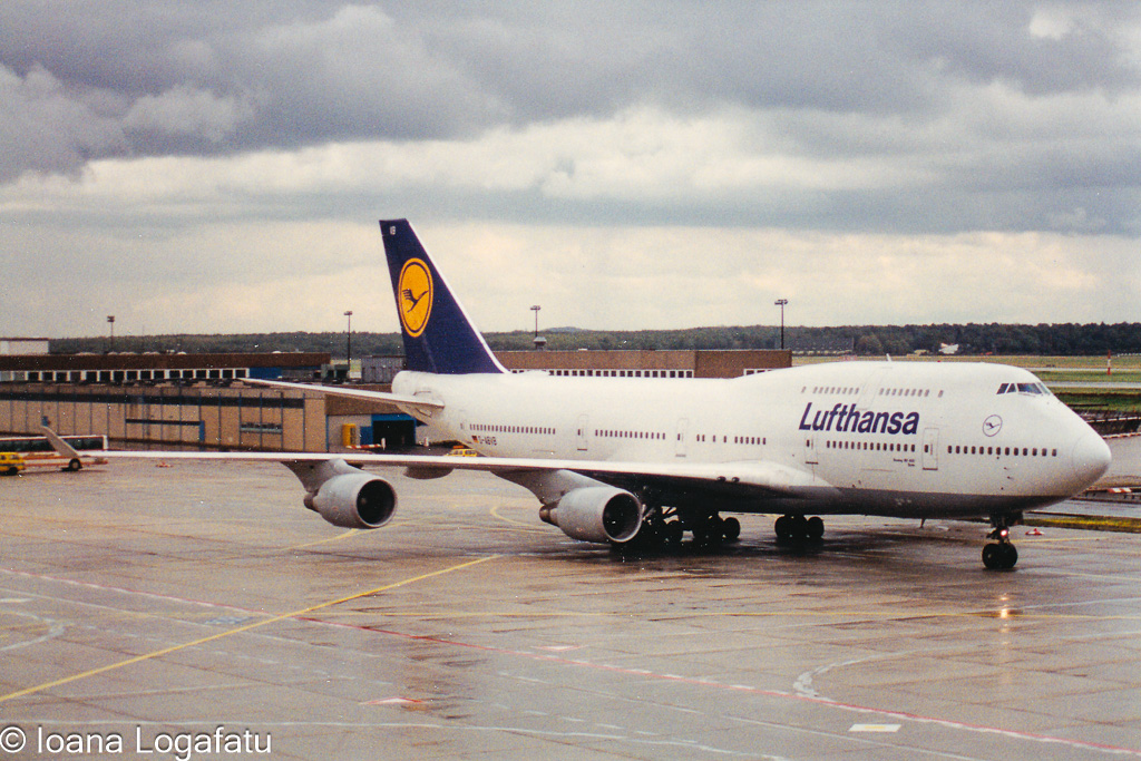 Lufthansa jumbo jet prepares for takeoff at dusk