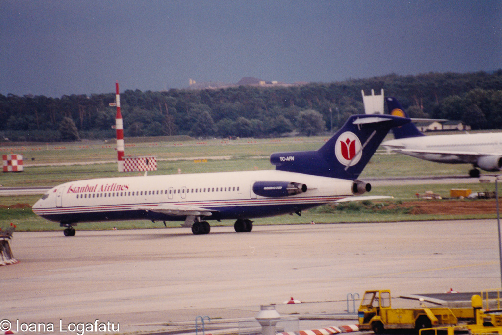 Planes taxiing under dramatic skies
