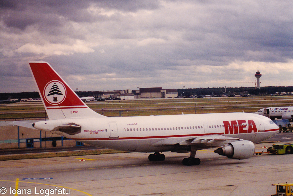 Old jet at the airport under cloudy skies