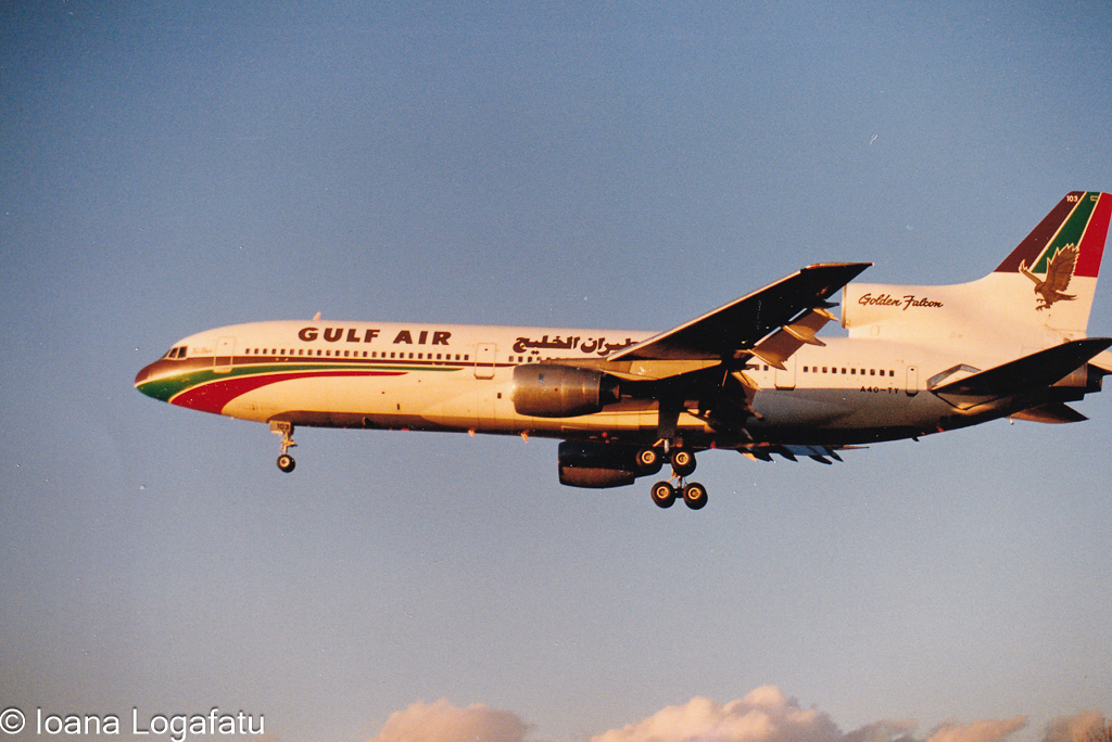 Gulf Air aircraft approaches runway during sunset