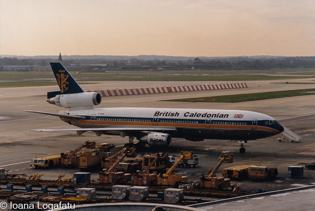 Historic aircraft at the bustling airport terminal