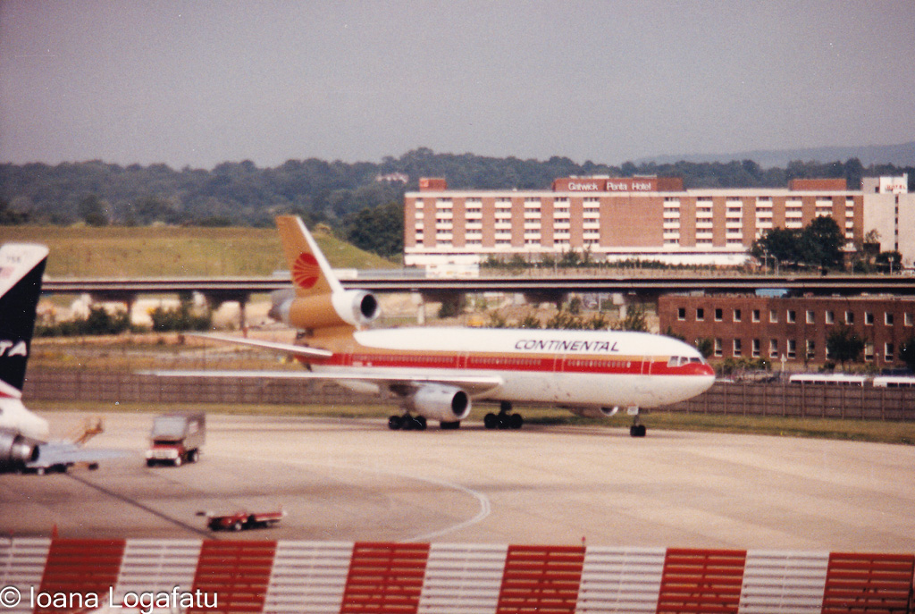 Continental Airlines aircraft on runway during day