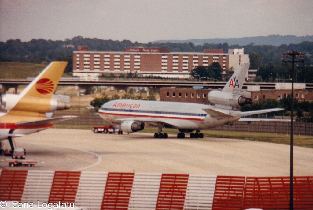Vintage airplane taxiing at the airport terminal