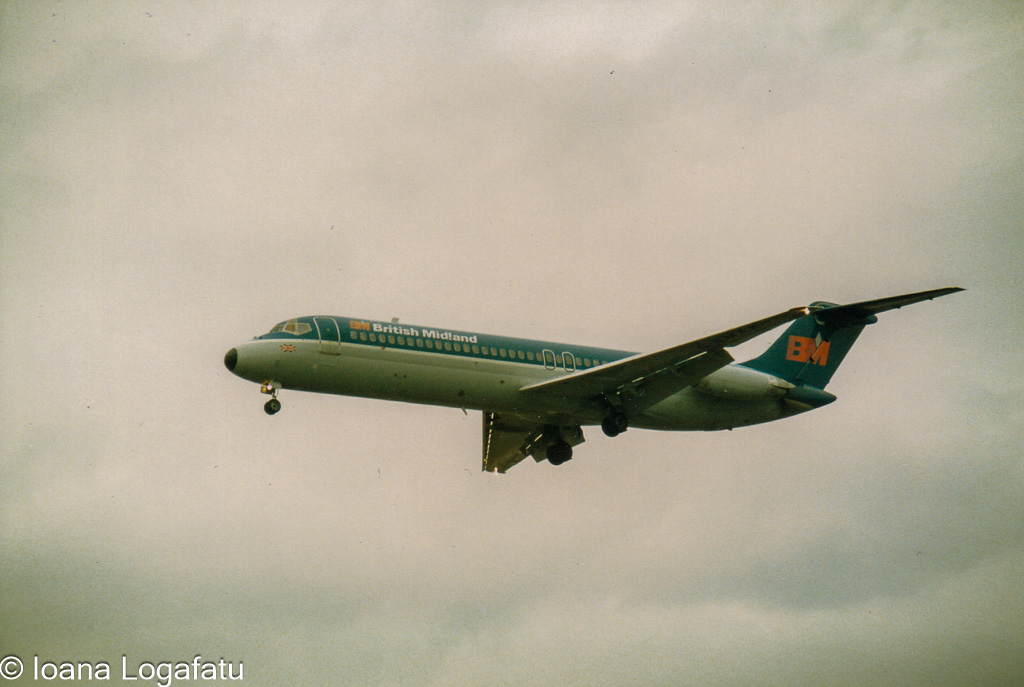 Aircraft gracefully descends through cloudy skies