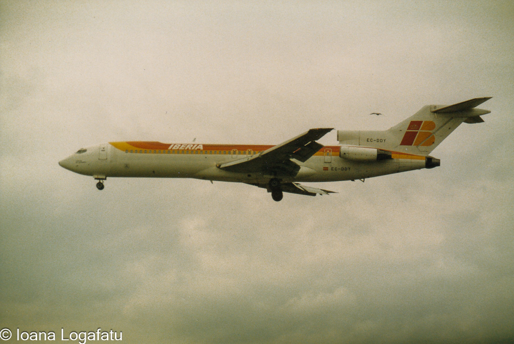 Vintage Iberia aircraft flies through clouds