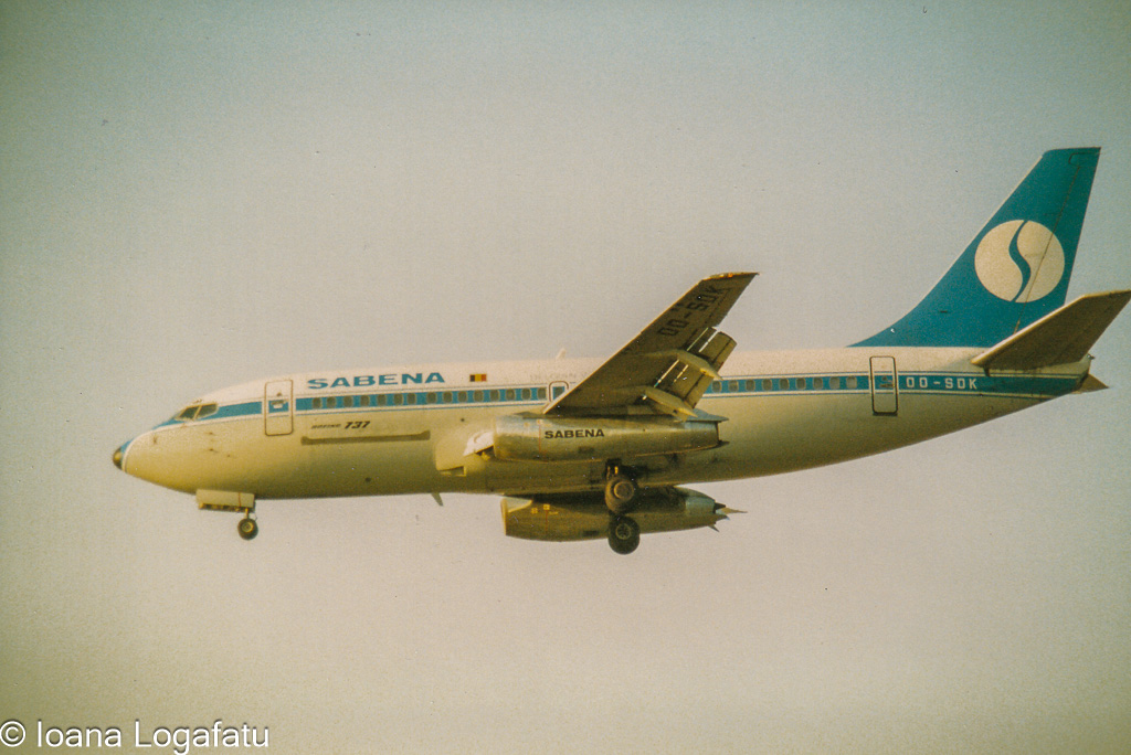 Classic airliner approaches landing at sunset