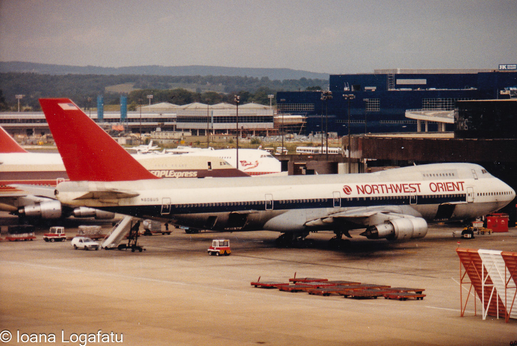 Planes idle at the bustling airport