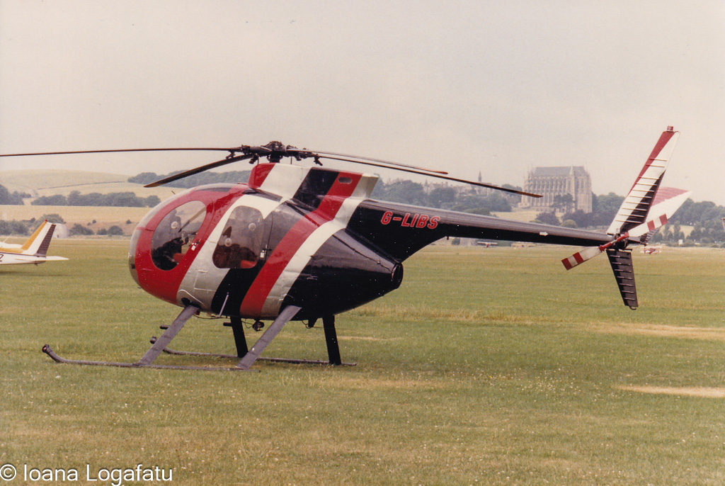 Helicopter poised for flight on a bright day