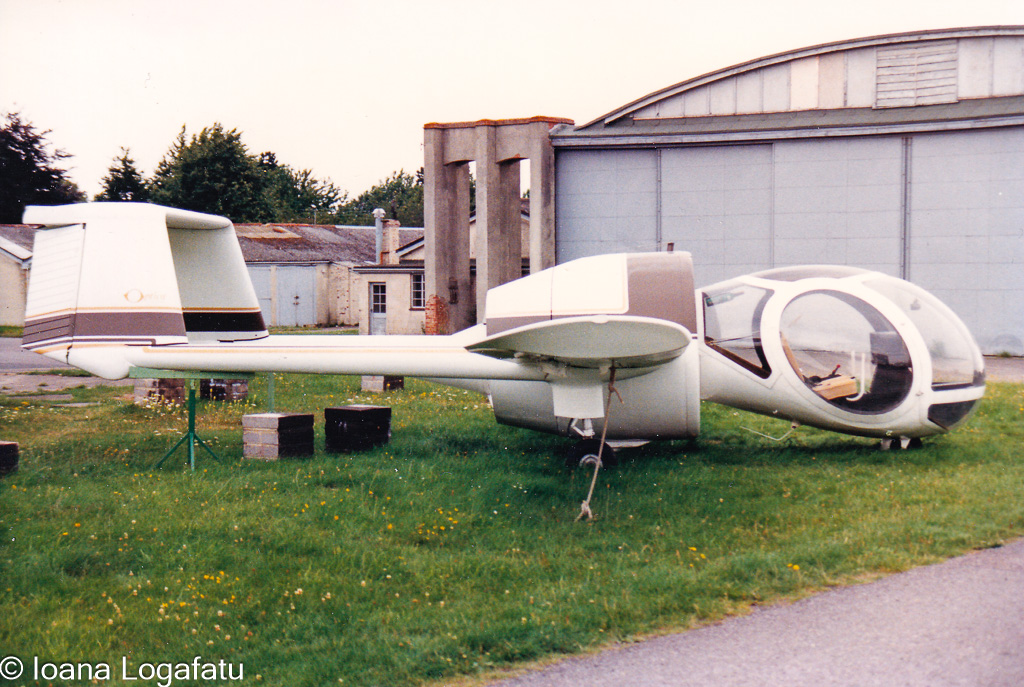 Vintage helicopter on display at an airfield