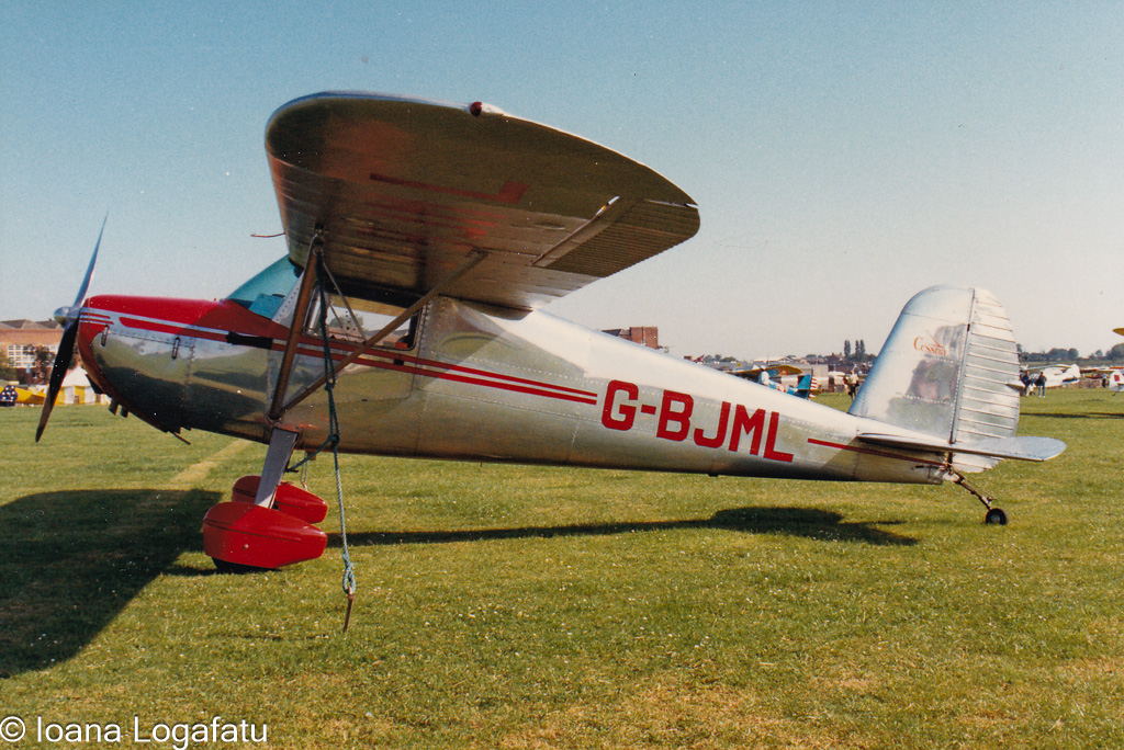 Classic airplane on the runway at summer air show