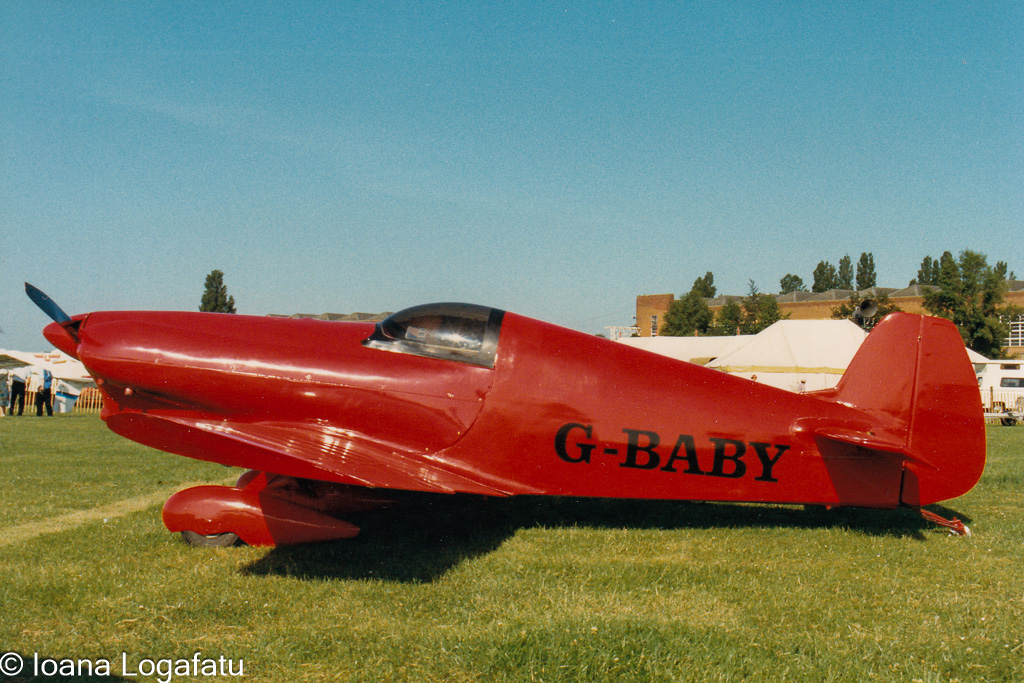 Vintage racing plane on display at airshow event