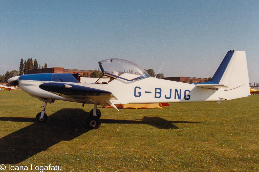 Classic aircraft on a sunny airfield during summer