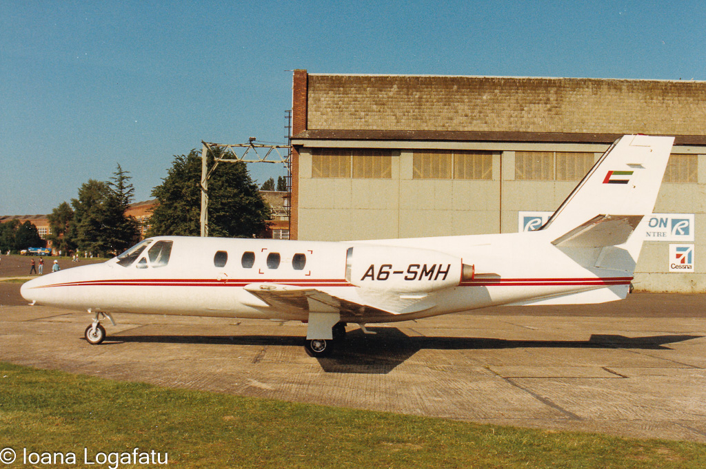 Luxury jet parked at the airstrip on a sunny day