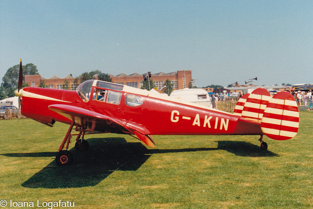 Vintage aircraft on display during sunny airshow