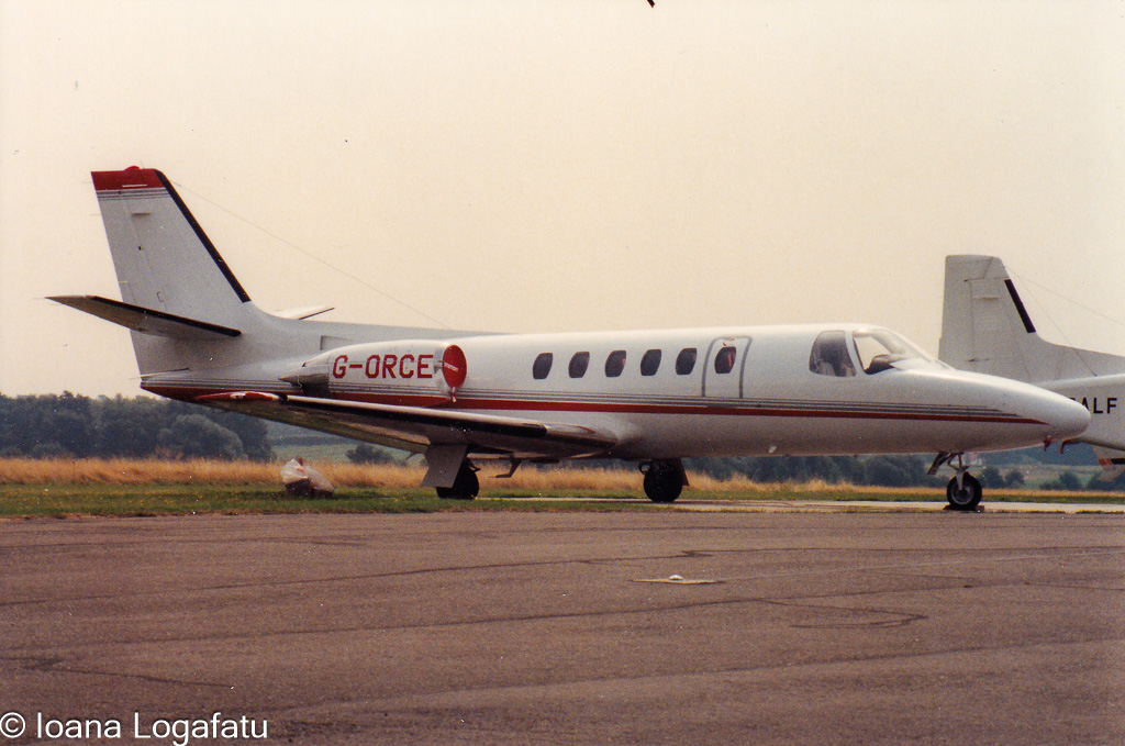 Jet on tarmac in peaceful setting