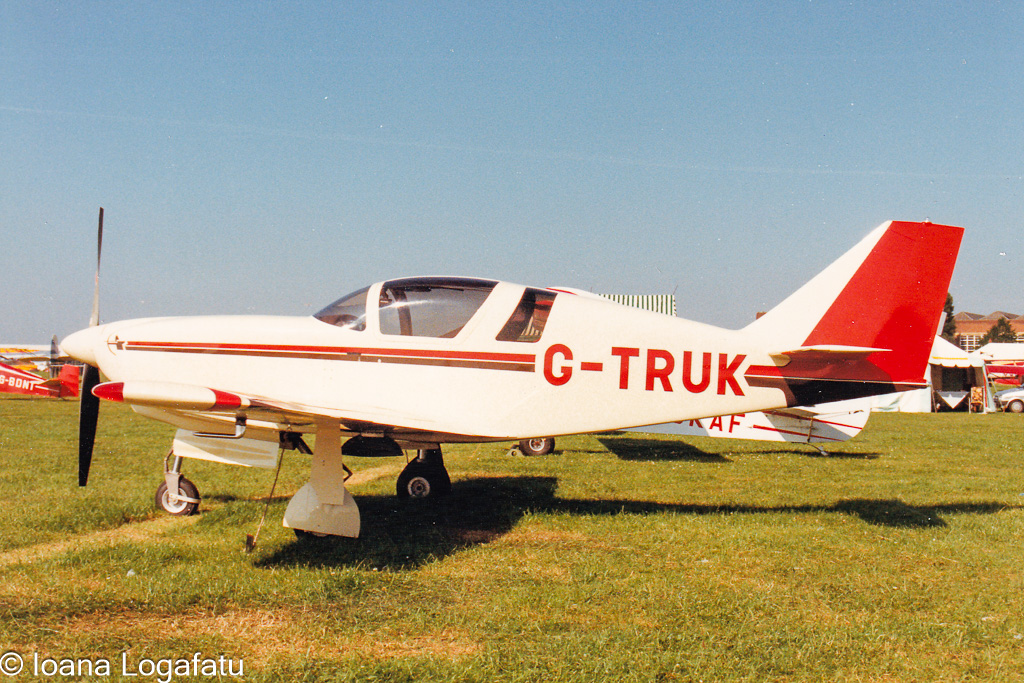 Classic aircraft showcased on a sunny day
