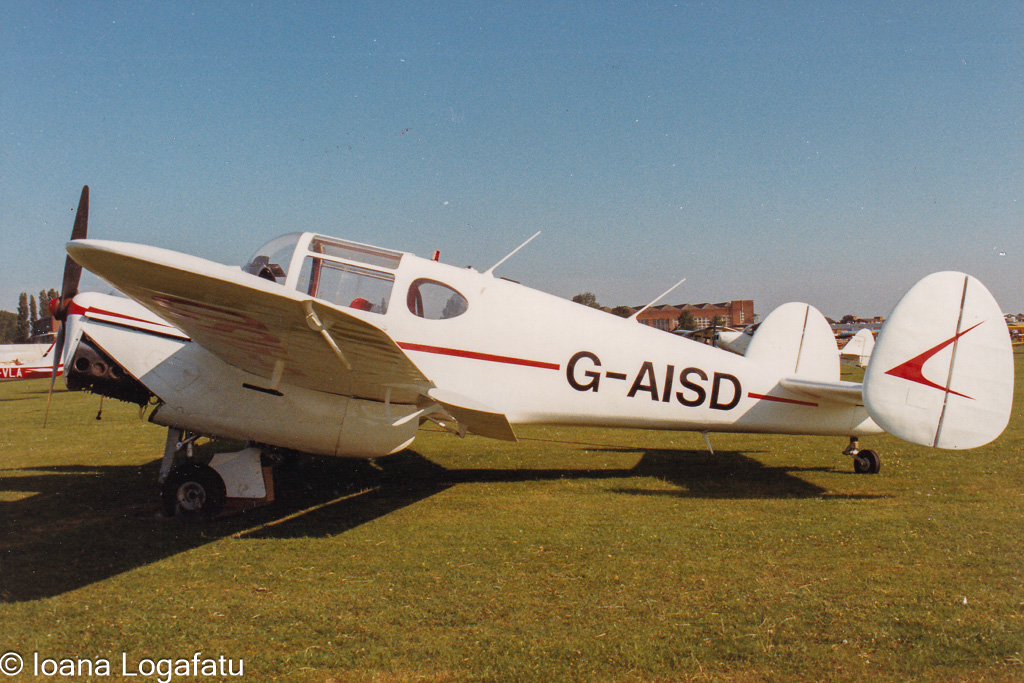 Vintage aircraft showcased on a sunny afternoon