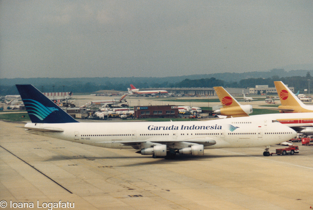 Garuda Indonesia plane at busy airport