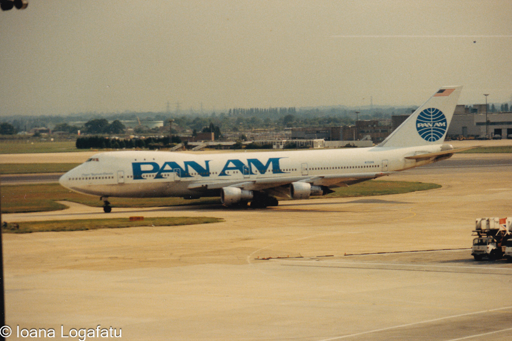 Vintage aircraft on the runway at bustling airport
