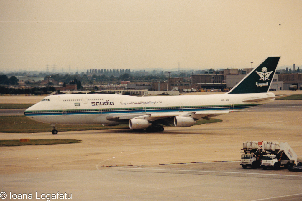 Famous airliner taxis at busy terminal