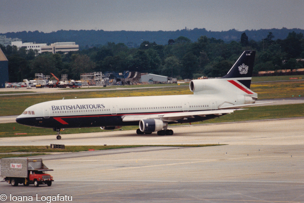 Classic aircraft taxiing on the runway at sunset