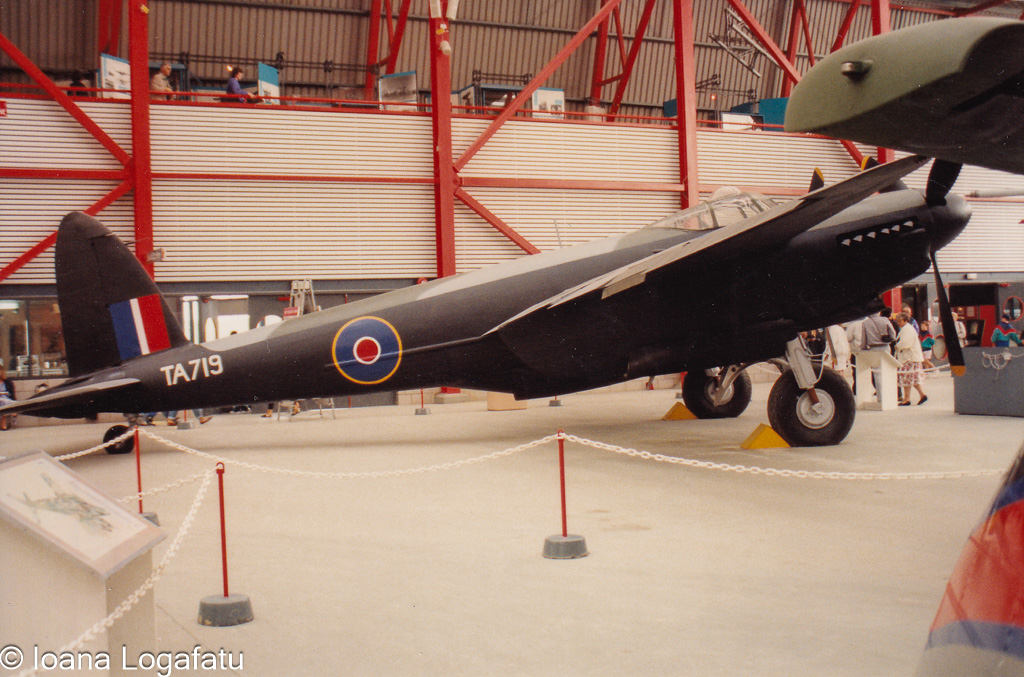 Historic aircraft on display in a vibrant hangar