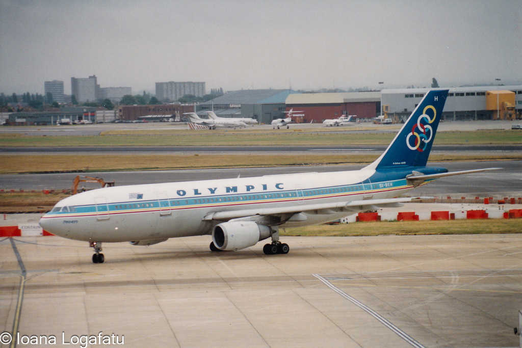 Vintage planes taxi at busy airport