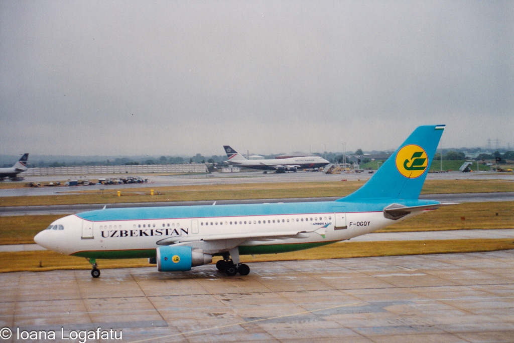 Airplane preparing for takeoff at a cloudy airport