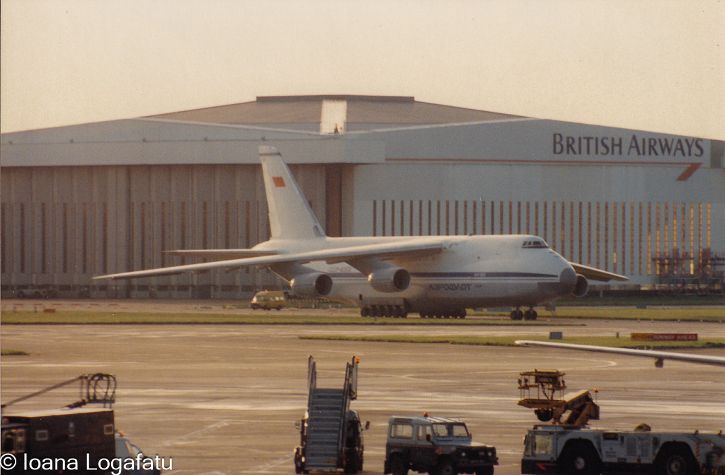 Historic aircraft on the runway at twilight