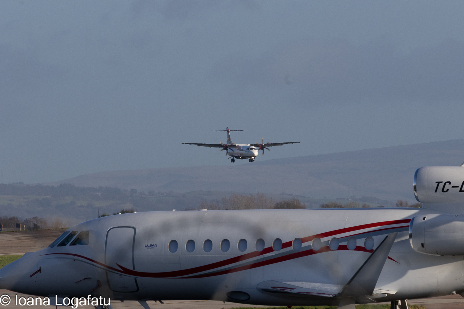 Planes wait to land on a clear day