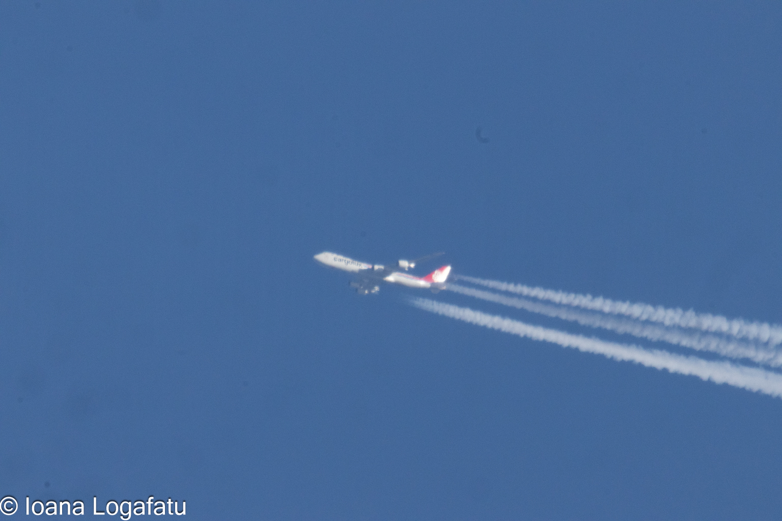 Majestic plane in bright blue sky