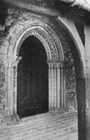 Historic stone doorway with intricate arch design