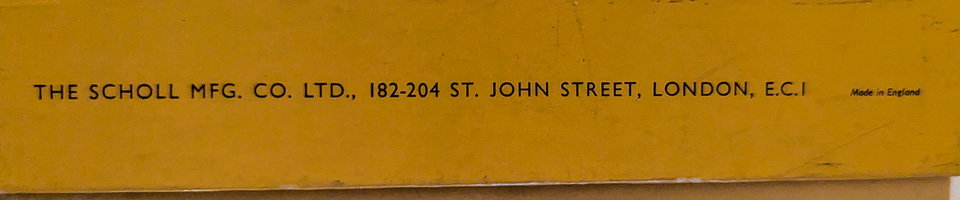 Sign displaying company information in London