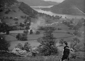 Hiking through a lush landscape near a serene lake