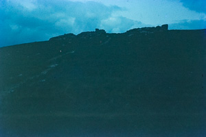 Landscape at dusk showcasing hillside ruins