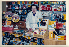 Woman in vintage camera shop