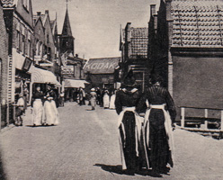 Historic street view with women walking in town