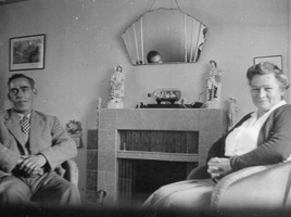 Couple sitting together in a cozy living room