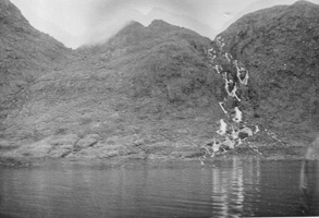 Cascading waterfalls by the lake