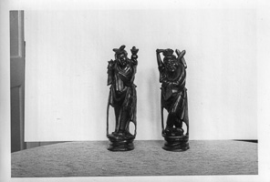 Intricate wooden sculptures in museum display