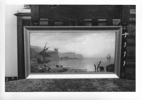 Serene coastal view with floating ships at dusk